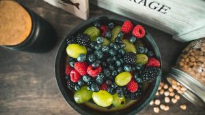 assorted fruits on gray metal bowl